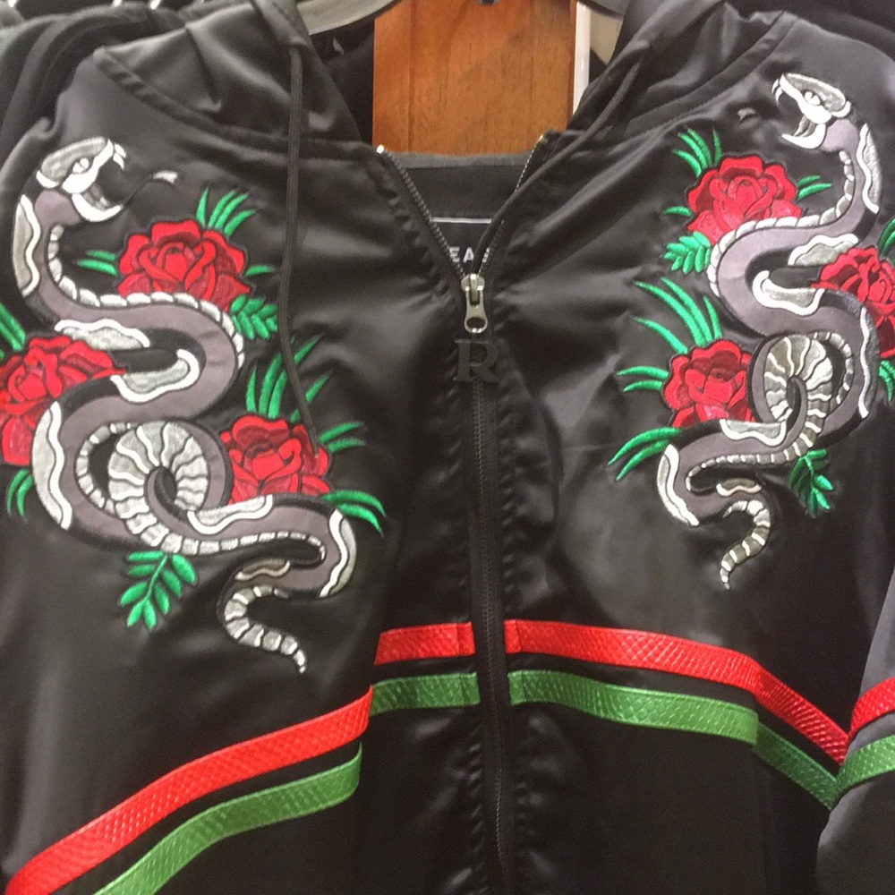 A jacket black silky chic .